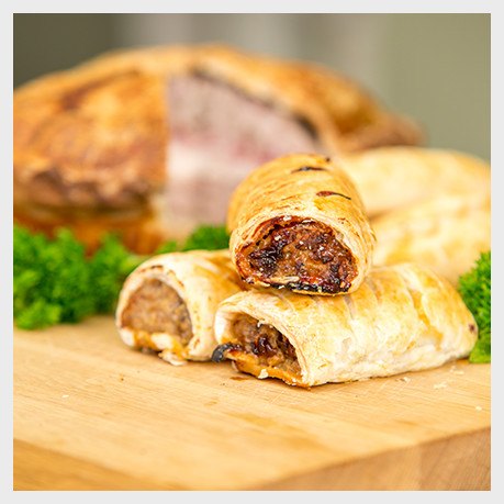 Sausage rolls and a pork pie, the pastry made in the shop by Debbie.
